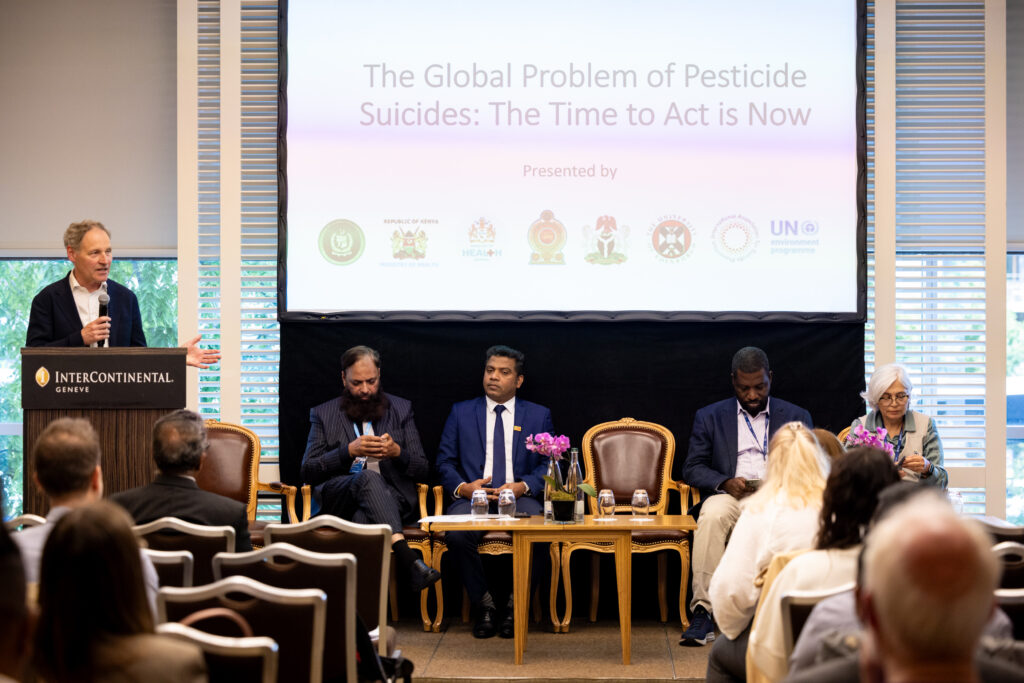 Professor Flemming Konradsen, facilitating the side-event on pesticide suicide prevention at the  79th World Health Assembly in Geneva. He is joined on stage by international representatives.