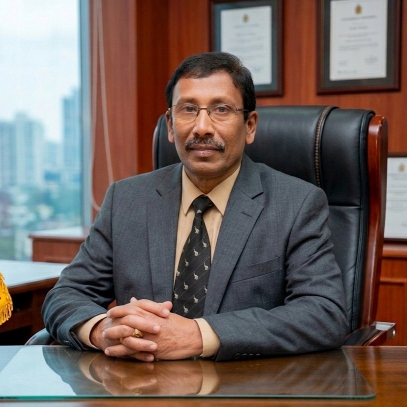 Man sitting behind a desk